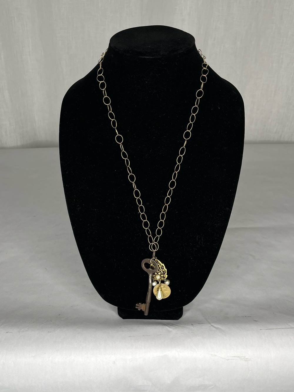 Gold key necklace
